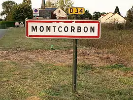 A roadsign, entering Montcorbon