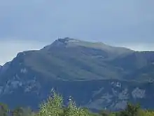 A mountain in the distance.