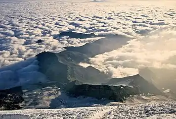 Burroughs Mountain above sea of clouds