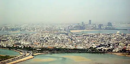 View of Muharraq with the skyline of Manama in the background (2011)