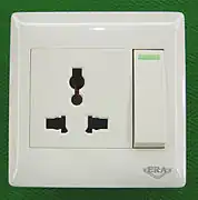A so-called "universal socket", which meets no official standard but is intended to accept a number of different plug types