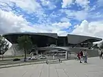 A wide view of the BMW World museum building.