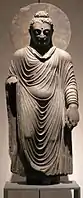 Statue of the Buddha, Takht-i-Bahi, 2nd–3rd century CE. Schist, H. 980&nbsp;mm (39&nbsp;in). Museum für Indische Kunst.