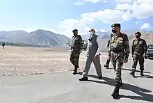  PM Narendra Modi walking with Indian soldiers