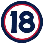 The number "18" in navy blue set against a white circle with a red and navy border