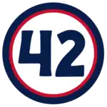 The number "42" in navy blue set against a white circle with a red and navy border
