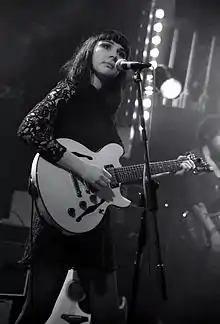 Natalie McCool performing at a show.