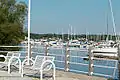 Boats and benches by Frenchman's Bay by Millennium Square