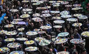 People taking vows for poor people in Isfahan, Iran.
