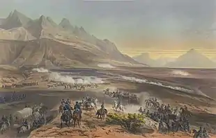 Painting shows a cannon being pulled into action by galloping horses in the foreground. The background is formed by towering mountains.