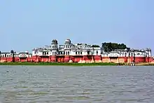 The Full View of NeerMahal from Rudrasagar Lake.