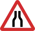 B14: Road narrows on both sides