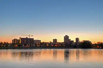 The skyline of New Brunswick seen at sunset along the Raritan River, the longest river solely within New Jersey