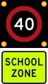 (R1-6) 40&nbsp;km/h school zone speed limit in effect when flashing