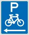 (R6-52.1) Cycle Parking (on the left of this sign)