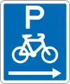(R6-52.1) Cyclists Parking (on the right of this sign)