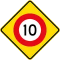 (W10-3) 10&nbsp;km/h speed limit ahead