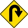 (W12-1.4/PW-19) Dangerous curve greater than 120 degrees, to right