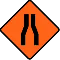 (TW-13.1) Road narrows on both sides