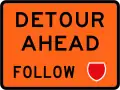 (TW-21) Detour ahead - follow state highway shield