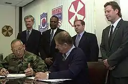 Image 39National Federation of Federal Employees officials sign a collective bargaining agreement with the U.S. 8th Army in October 2002.