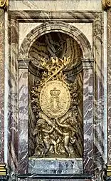 Baroque sculpture of cherubs holding a medallion with Louis XIV's monogram, unknown sculptor, late 17th-very early 18th century, Palace of Versailles, Versailles, France