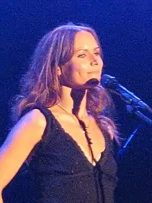 Persson performing in 2004