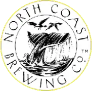 A whale diving through a ring emblazoned with the words North Coast Brewing Company