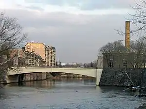 Market Street Bridge, looking downstream, with Brandywine Village on the left, and the Wilmington Pumping Station on the right.  The bridge marks the approximate high level of tidewater on the Brandywine.