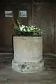 Norman baptismal font in St Denys' parish church
