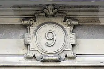 Renaissance Revival cartouche on Rue des Archives in Paris