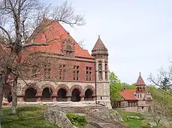 Oakes Ames Memorial Hall with Ames Free Library in background.