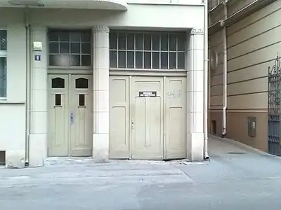 Adorned entrance doors