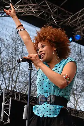 Image 8Oceana (singer)Photo: ChrisHamburgOceana (born 1982) is a German singer of German/Martiniquen descent. She is shown here performing at the Radio Hamburg Top 820.More selected pictures