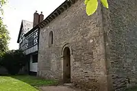 Odda's Chapel, Deerhurst, attached to later house.