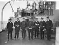 Hustvedt (third from left) as a lieutenant commander with other officers aboard the decommissioned battleship USS&nbsp;Alabama&nbsp;(BB-8) in September 1921 just before Alabama was expended in aerial bombing trials