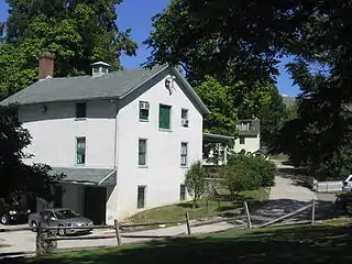 The Wister's carriage house and Peale House.