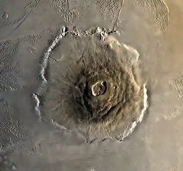 Image 10Olympus MonsImage credit: United States Geological SurveyA composite image of Olympus Mons on Mars, the tallest known volcano and mountain in the Solar System. This image was created from black-and-white imagery from the USGS's Mars Global Digital Image Mosaic and color imagery acquired from the 1978 visit of Viking 1.More selected pictures