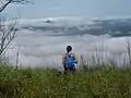 A tourist above clouds