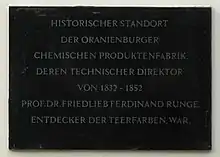 Commemorative plaque in Oranienburg. It reads: Historical site of the Oranienburg chemical product factory, whose technical director from 1832 to 1852 was Prof. Dr. Friedlieb Ferdinand Runge, discoverer of coal tar dyes.