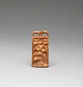 Ornament; 4th century; ivory (walrus); height: 6.4 (2.mw-parser-output .frac{white-space:nowrap}.mw-parser-output .frac .num,.mw-parser-output .frac .den{font-size:80%;line-height:0;vertical-align:super}.mw-parser-output .frac .den{vertical-align:sub}.mw-parser-output .sr-only{border:0;clip:rect(0,0,0,0);clip-path:polygon(0px 0px,0px 0px,0px 0px);height:1px;margin:-1px;overflow:hidden;padding:0;position:absolute;width:1px}1⁄2 in.); Metropolitan Museum of Art