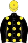 Black, yellow spots on body, yellow cap