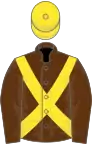 Brown, yellow cross-belts and cap