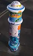 Decorated bollard in Winchester, England