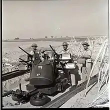 Pakistani soldiers operating a M45 Quadmount during the 1965 conflict with India