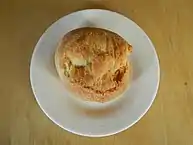 The "putok" is a variation on the pandesal made from monay dough