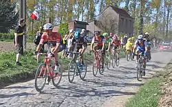 The winning breakaway in Bourghelles, at 26 km (16 mi) from the finish. From left to right: Jasper Stuyven, Gianni Moscon, Greg Van Avermaet, Sebastian Langeveld, Jürgen Roelandts and Zdeněk Štybar