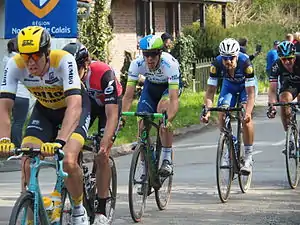 Sep Vanmarcke, Edvald Boasson Hagen, Mathew Hayman, Tom Boonen and Ian Stannard, cycling in a line at the end of the race