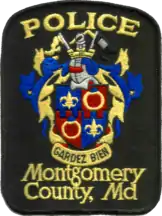 Patch.mw-parser-output cite.citation{font-style:inherit;word-wrap:break-word}.mw-parser-output .citation q{quotes:"\"""\"""'""'"}.mw-parser-output .citation:target{background-color:rgba(0,127,255,0.133)}.mw-parser-output .id-lock-free a,.mw-parser-output .citation .cs1-lock-free a{background:url("//upload.wikimedia.org/wikipedia/commons/6/65/Lock-green.svg")right 0.1em center/9px no-repeat}.mw-parser-output .id-lock-limited a,.mw-parser-output .id-lock-registration a,.mw-parser-output .citation .cs1-lock-limited a,.mw-parser-output .citation .cs1-lock-registration a{background:url("//upload.wikimedia.org/wikipedia/commons/d/d6/Lock-gray-alt-2.svg")right 0.1em center/9px no-repeat}.mw-parser-output .id-lock-subscription a,.mw-parser-output .citation .cs1-lock-subscription a{background:url("//upload.wikimedia.org/wikipedia/commons/a/aa/Lock-red-alt-2.svg")right 0.1em center/9px no-repeat}.mw-parser-output .cs1-ws-icon a{background:url("//upload.wikimedia.org/wikipedia/commons/4/4c/Wikisource-logo.svg")right 0.1em center/12px no-repeat}.mw-parser-output .cs1-code{color:inherit;background:inherit;border:none;padding:inherit}.mw-parser-output .cs1-hidden-error{display:none;color:#d33}.mw-parser-output .cs1-visible-error{color:#d33}.mw-parser-output .cs1-maint{display:none;color:#3a3;margin-left:0.3em}.mw-parser-output .cs1-format{font-size:95%}.mw-parser-output .cs1-kern-left{padding-left:0.2em}.mw-parser-output .cs1-kern-right{padding-right:0.2em}.mw-parser-output .citation .mw-selflink{font-weight:inherit}Montgomery County Department of Police (2015). "The Meaning of our Patch". Maryland: Montgomery County Department of Police. Archived from the original on July 31, 2017. Retrieved July 31, 2017.{{cite web}}: CS1 maint: bot: original URL status unknown (link)