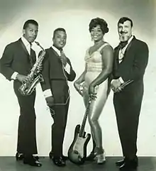 Publicity photo of Pearl Reaves and the Paul Farano Trio taken in the 1960s. Robert Green, Eddie Shaw, Pearl Reaves Farano, Paul Farano.